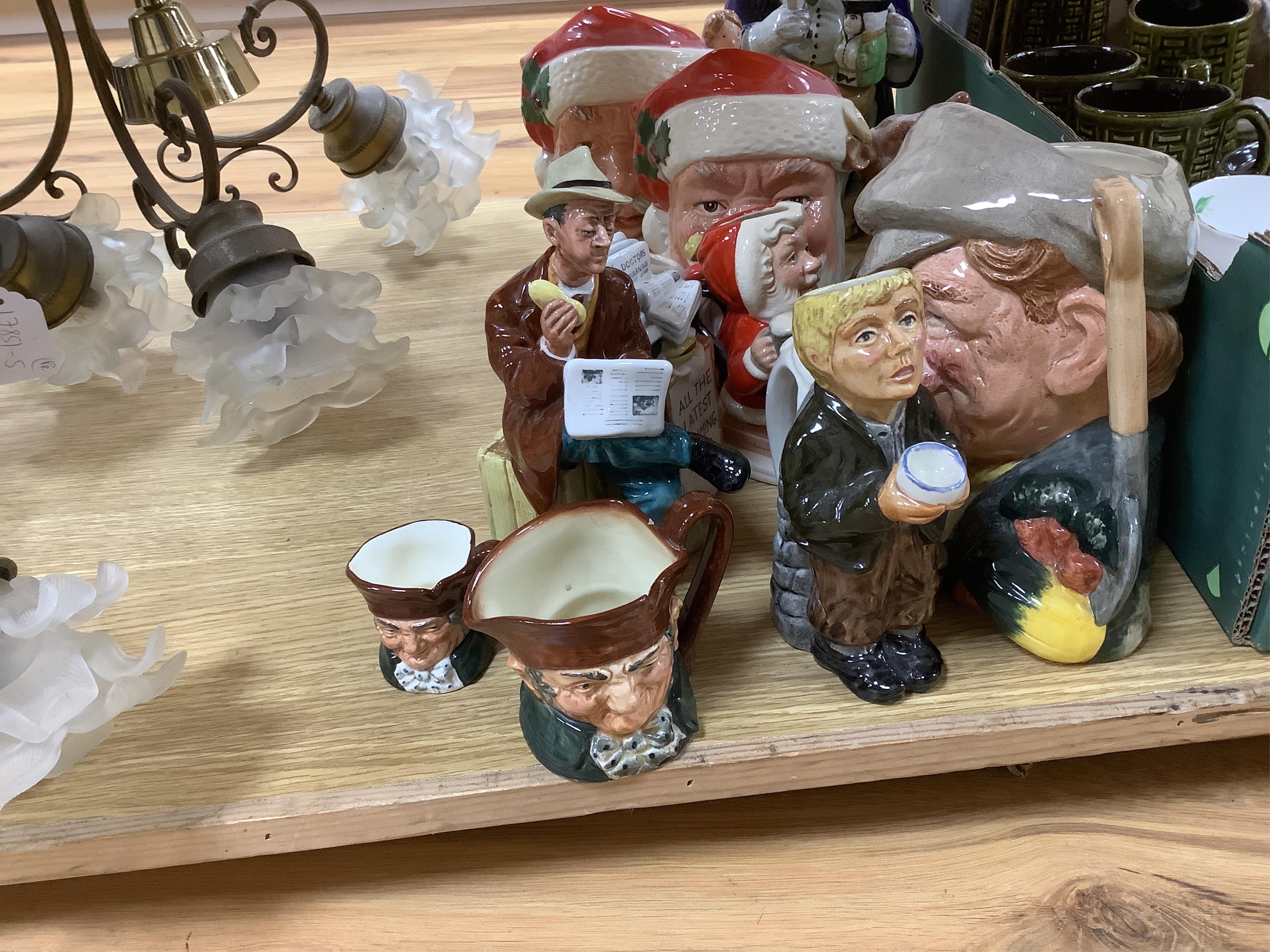 A collection of ceramics to include Doulton Toby jugs, Goebel figurines and Adderley part tea set